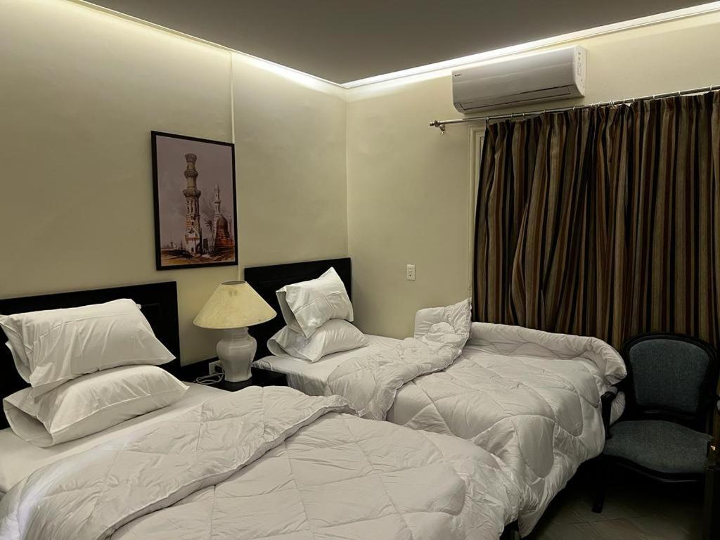 Alaa Eldein Pyramids Lights Hotell Kafret el-Gabal Exteriör bild